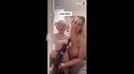 'Oops! Curious Toddler Puts her Mouth on a Vacuum Hose by Mistake'