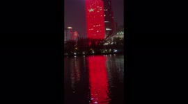 Building illuminated by China's flag's colours to celebrate CCP's 100th anniversary