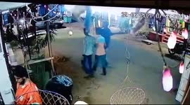 Miraculous escape for the three young people even they was hit by a speedy car in  South India.