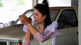 Jobless Thai singer performs in market to get through Covid-19 hard times