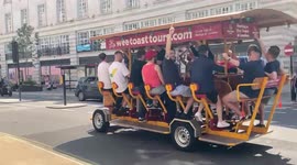 Beer bike full of singing England fans pedals into London's West End on Friday
