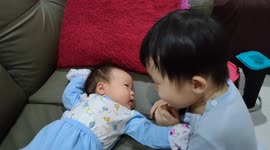 Adorable moment of a brother singing