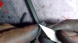 Chinese art teacher carves miniature Tiananmen into lead of pencil