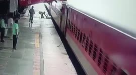 Elderly man dragged along platform by moving train in northern India