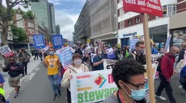 NHS staff march through central London to demand pay rise