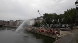 Firefigthers of Paris training on the Seine River near the Notre-Dame Cathedral.3june2021 . Pont Neuf