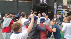 England fans sing in London's Leicester Square ahead of Euro 2020 match