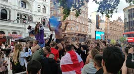 Fans in Leicester Square chant their support for England ahead of Euro 2020 match