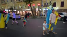 Flags and families in Ukrainian capital before Euro 2020 match against England