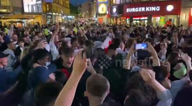 England fans celebrate victory over Ukraine in London's West End