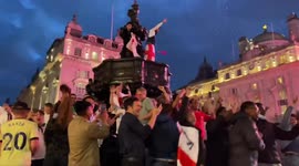 England fans celebrate as England make it through to the semi finals of Euros 2020