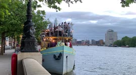England fans on boat in Thames celebrate another goal against Ukraine