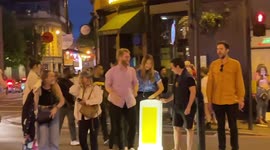 People celebrate England’s 4-0 Ukraine win in Shoreditch, London, cars honk, people cheer