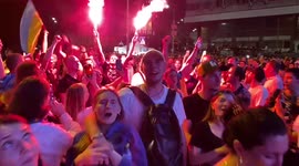 Flares, melancholy and chanting as fans in Kyiv process 0-4 defeat to England