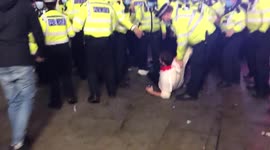 Tension and breaking glass as London police disperse fan gathering that turns tense