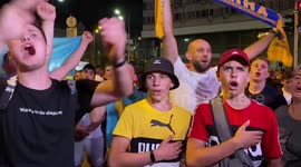 Post-match shock gives way to patriotic songs and street parties in Kyiv, Ukraine