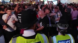 English football fans gather in central London to celebrate win against Ukraine