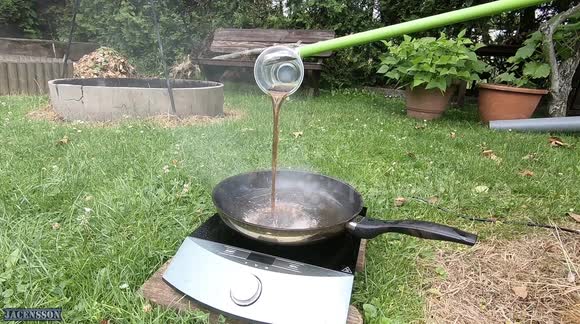 Poland-based YouTuber pours Coca-Cola into pan of boiling oil