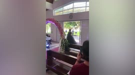 Bride wears unusual black gown during wedding