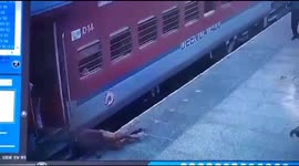 Security personal rescued elderly man who slips from moving train in northern India