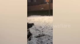 Thick hail covers streets as heavy storm hits Mexico