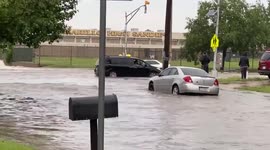 Cars wade through flooding in Amarillo, Texas