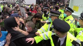Traveller and squatter rights protest ends in scuffles with police outside Downing Street, London