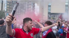 England fans let off flares and throw beer outside Wembley ahead of Euros game