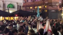 England football fans celebrating in Leicester Square london - crazy party