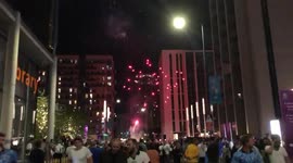 Football fans fire off fireworks outside Wembley Stadium following historic win