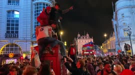 England fans dance on telephone box and even London bus after semi-final win