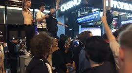 England fans celebrate and throw traffic cones in Leicester Square after Euro 2020 semi-final win against Denmark