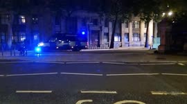 Convoy of Metropolitan Police TSG (Territorial Support Group) carriers seen in Aldwych, London
