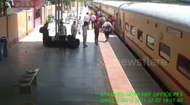 Girl nearly falls under moving train, gets rescued in northern India