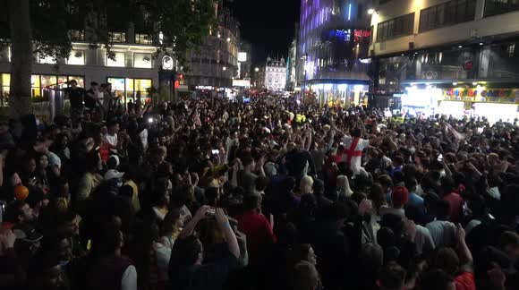 Covid, what Covid? Hundreds gather in London's Leicester Square after England beat Denmark