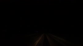 Massive close Lightning strike on a road while driving down highway