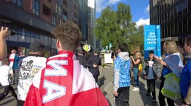 Fans mob Rio Ferdinand for a photograph