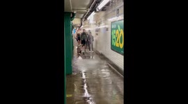 NYC metro station flooded with water from Tropical Storm Elsa