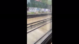 US: Heavy Rain Impacted By Tropical Storm Elsa Causes Flooding NYC’s Subway Station