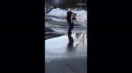 Dog who refuses to step in puddles has to be carried by owner