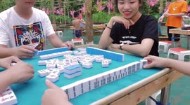 Chinese amusement park places mahjong tables in water to attract tourists