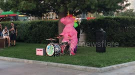 Pink unicorn drummer smashes out heavy metal classic in Russian park