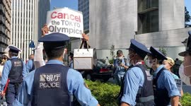 'No Olympics' protest outside Tokyo hotel of IOC President Thomas Bach
