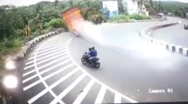 Speeding truck hurtles off road on super sharp bend in road in South India