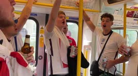 England fans get into the mood early, singing and drinking at 10am on the tube to Wembley