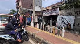 Indonesians queue for oxygen in Jakarta amid feared shortage during Covid-19 rise