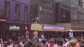 England fan comes under bottle rain as celebrations srart early in West End
