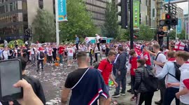 England football fans smash glass bottles and cause mayhem outside Wembley Stadium ahead of the England v Italy Euro 2020 final in London