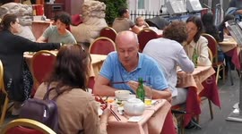 Post-pandemic bounce-back? Warm weather sends Londoners to eat outside restaurants in Chinatown