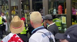 England fans break police line to join the party